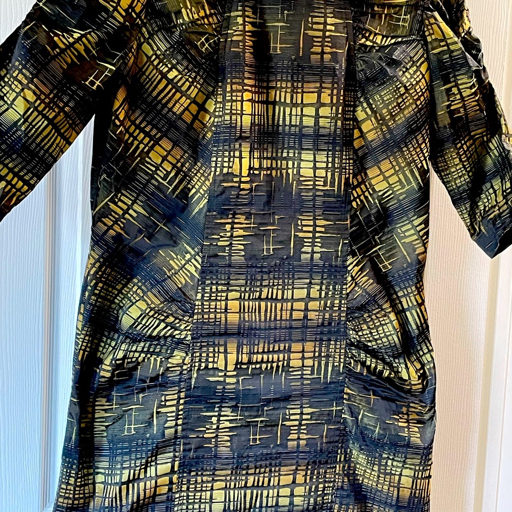 Fitted and ruched Comrags mid length dress.